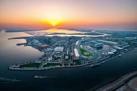 Aerial view of Yas Island, Abu Dhabi, featuring Ferrari World’s iconic red roof